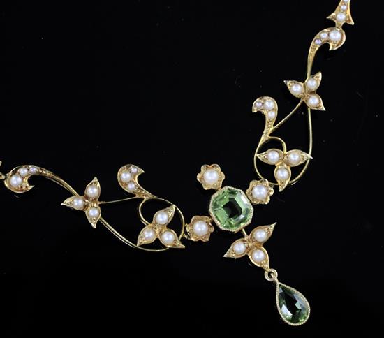 A late Victorian 15ct gold, peridot and seed pearl drop necklace, 42cm.